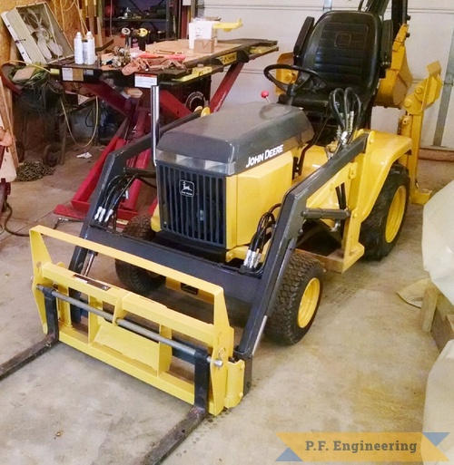 Jake T., John Deere 318 Micro Hoe | John Deere 318 Micro Hoe Loader with Pallet forks by Jake T.