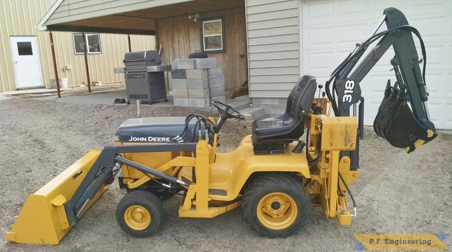 Jake T., John Deere 318 Micro Hoe | John Deere 318 Micro Hoe left side by Jake T.