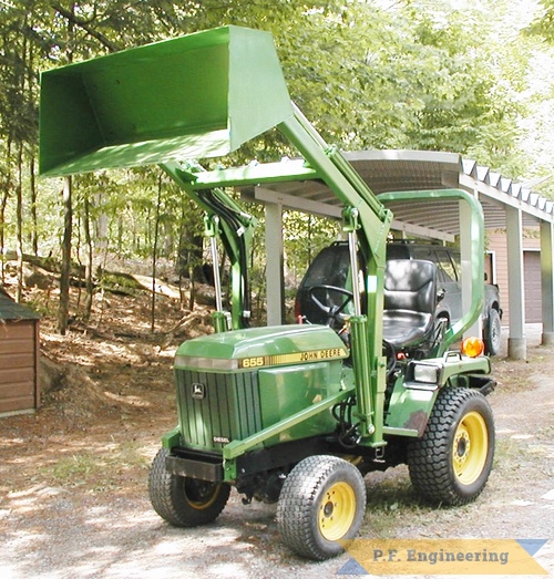 Rae C., Australia John Deere 655 | john deere 655 compact tractor loader with bucket raised