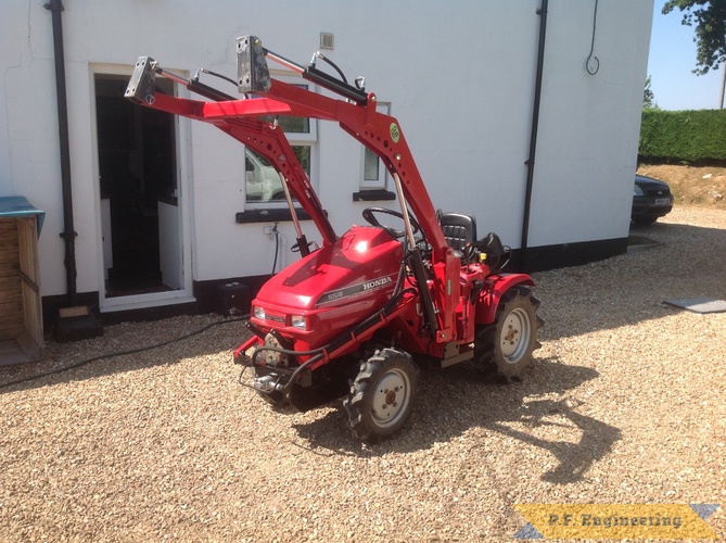 Simon B., Honda 5518 loader | honda 5518 loader boom raised by Simon B.