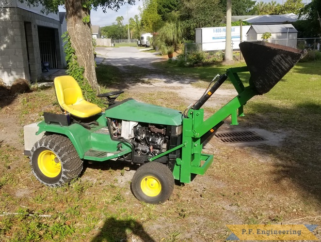 Ted L. Tarpon Springs, FL - John Deere 425 -  Pin-on Mini Payloader | Ted L. Tarpon Springs, FL JD 425 bucket curl