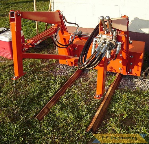 Vince also designed this great storage rack for his loader, just slip the bucket under the lip, unplug from the tractor and back away. | Case Ingersoll 3018 garden tractor loader_3
