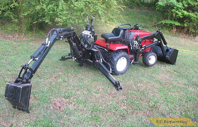 the hard lines are a nice touch and help keep hoses out of the way.  | Sears Craftsman GT5000 backhoe and loader_1