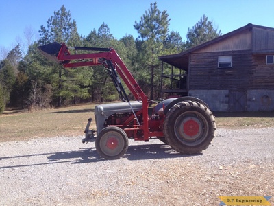 Ford 9N loader bucket raised