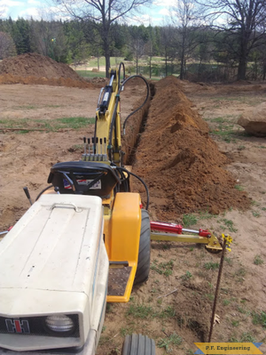 Jesse D., cub cadet1450 micro hoe Coloma, WI Trenching 2