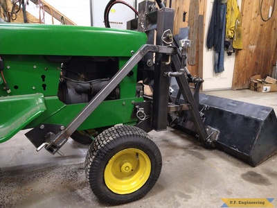 Richard W. from Winchester ID and his JD 140 with pin on mini payloader view of oil reservoir in the tower