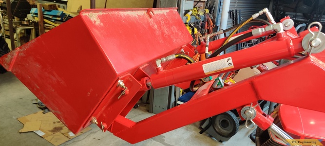 Don A. and his Wheelhorse 310-8 loader in Thibodaux, LA boom end mod for increased roll back