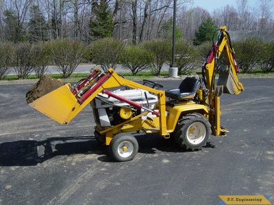 cub 149 with bucket of processed gravel